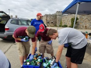 Scouts sorting cans